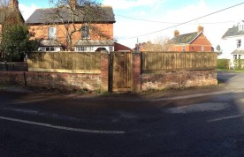 New closeboard fencing on a wall